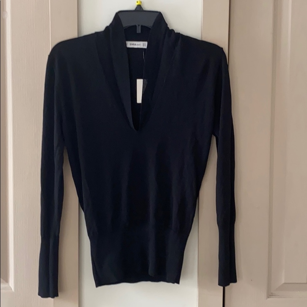 Deep v neck knit sheer sweater from Zara.